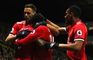 Ashley Young celebrates with his teammates